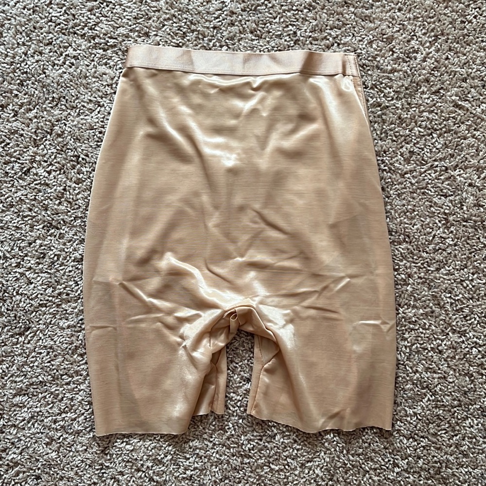 Barely there low back short. New with tags! Size S, color is Clay.